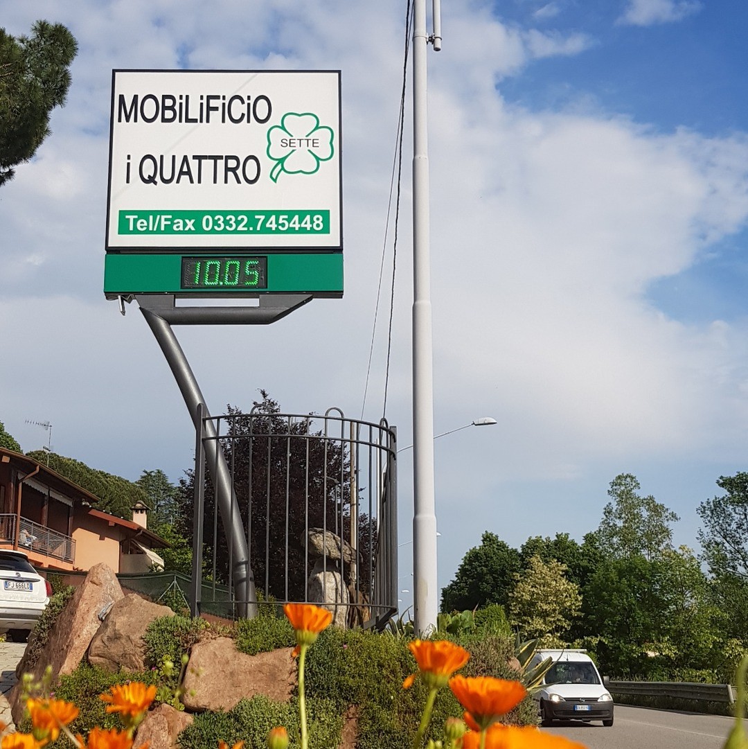 Insegna del Mobilificio I Quattro Sette